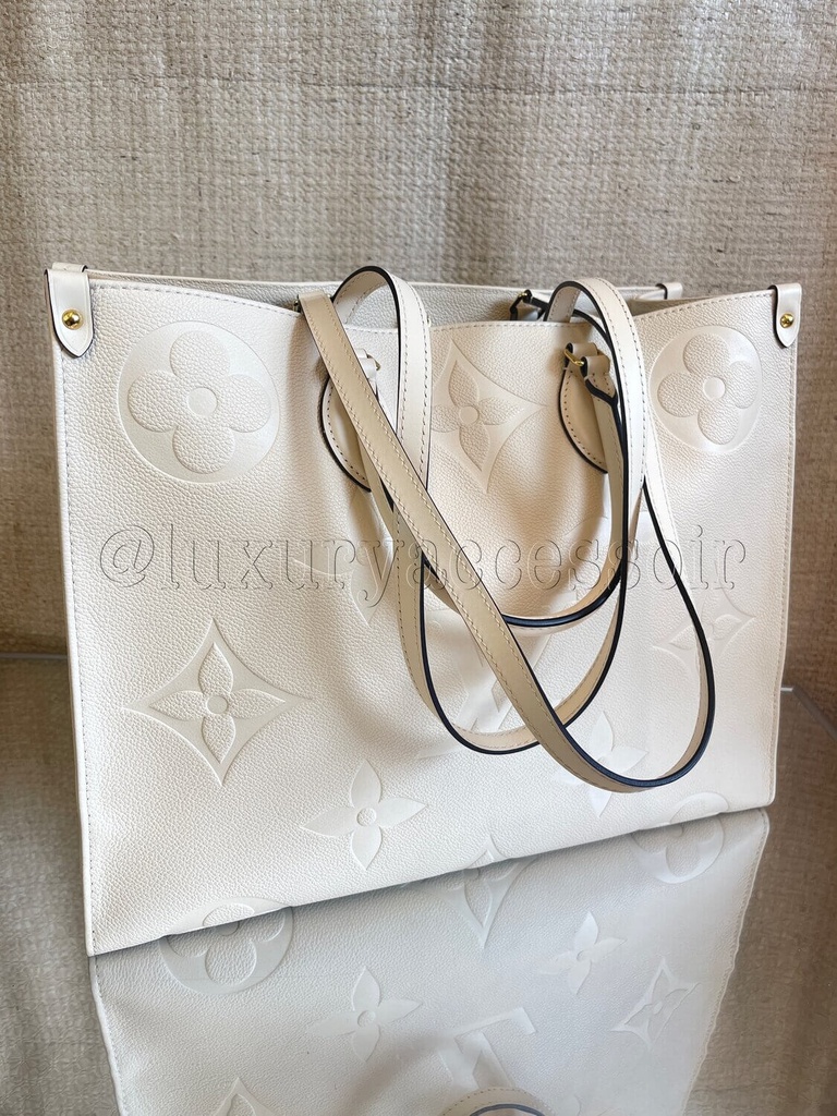 100 Original Louis Vuitton Onthego GM Empreinte creme cream